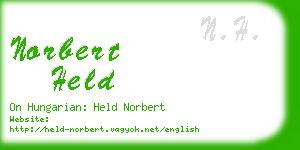 norbert held business card